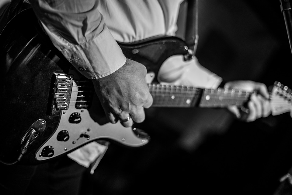 musician playing guitar